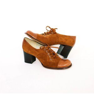 Vintage Carel Paris leather lace up heeled boots